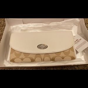 Coach wallet tan and white leather